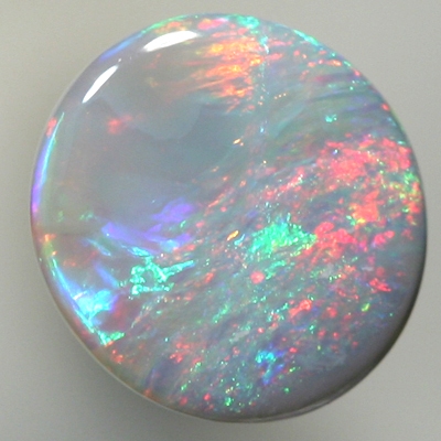 SOLID SEMI BLACK OPAL Pretty opal, reds to purple to green to red